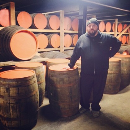 Against the Grain owning partner Sam Cruz picks up his empty brandy barrels at Copper & Kings to begin the aging process for a custom craft beer to serve at Lock, Stock & Smoking Barrels Oct. 30, 2015.